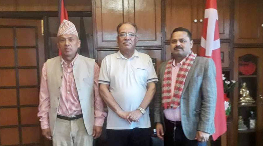 Deepak-timilsina-with-prachanda.jpg